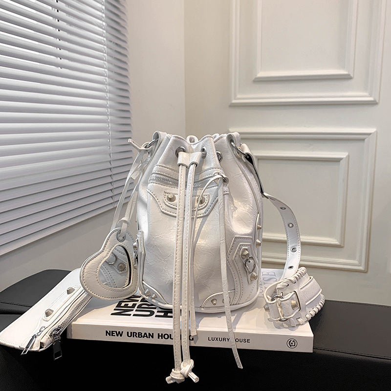 Women's Locomotive Style Rivet Trendy Drawstring Fashion Crossbody Bags