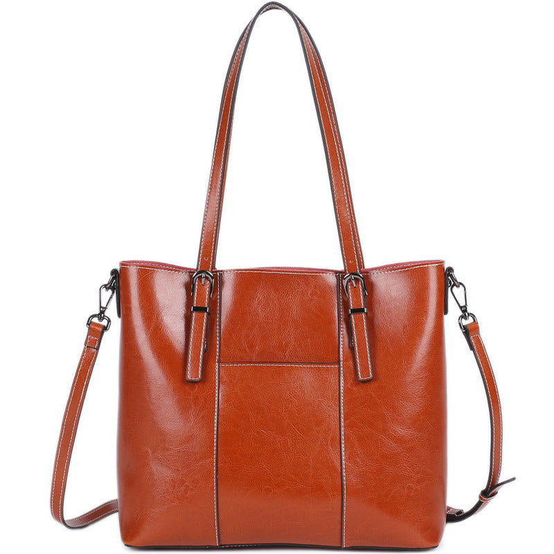 Women's First Layer Cowhide Large Capacity Commuter High Sense Class Handbags