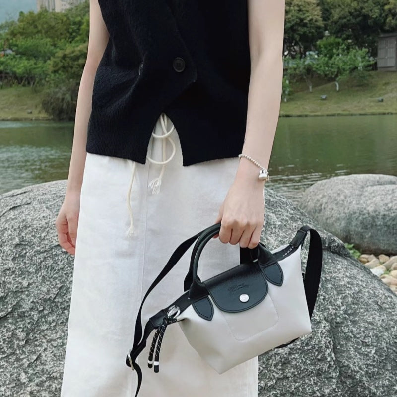 Medium Mini Dumpling Punch Nylon Change Crossbody Bags