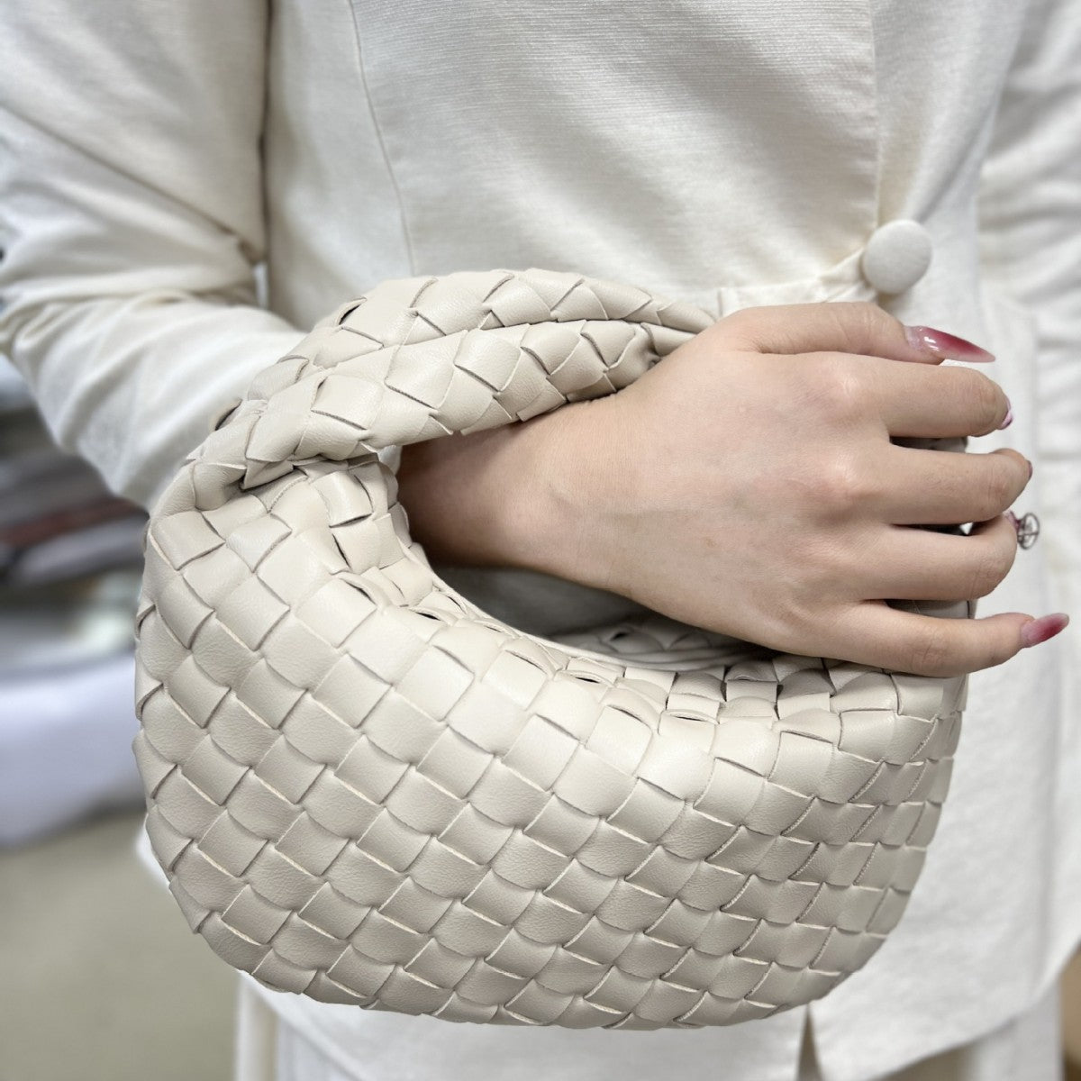 Women's High-grade Handmade Woven Fashion Dumpling Portable Handbags
