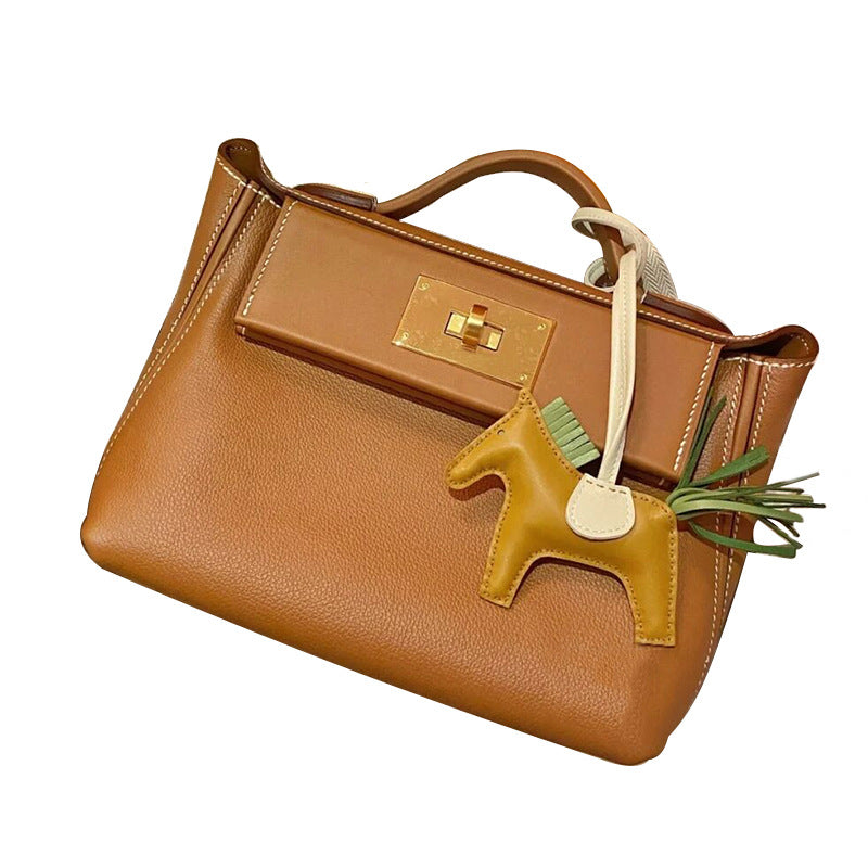 Women's Dumpling Kelly Layer Cowhide Wings Shoulder Bags