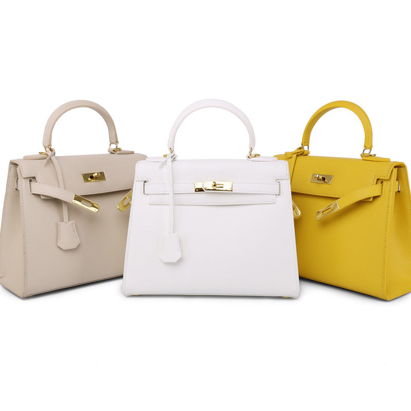 Women's Palm Print Cowhide Platinum Twist Genuine Handbags