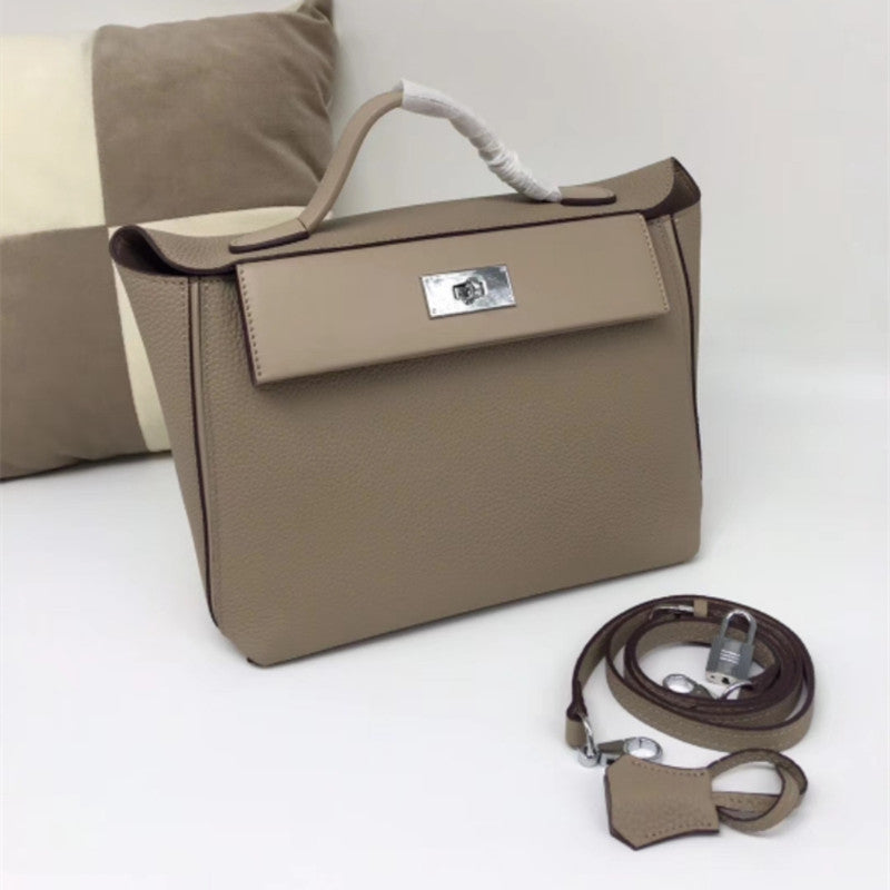 Women's Dumpling Kelly Layer Cowhide Wings Shoulder Bags