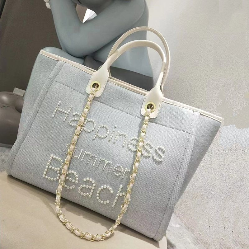 Women's Genuine Leather Portable Chain Pearl Beach Handbags
