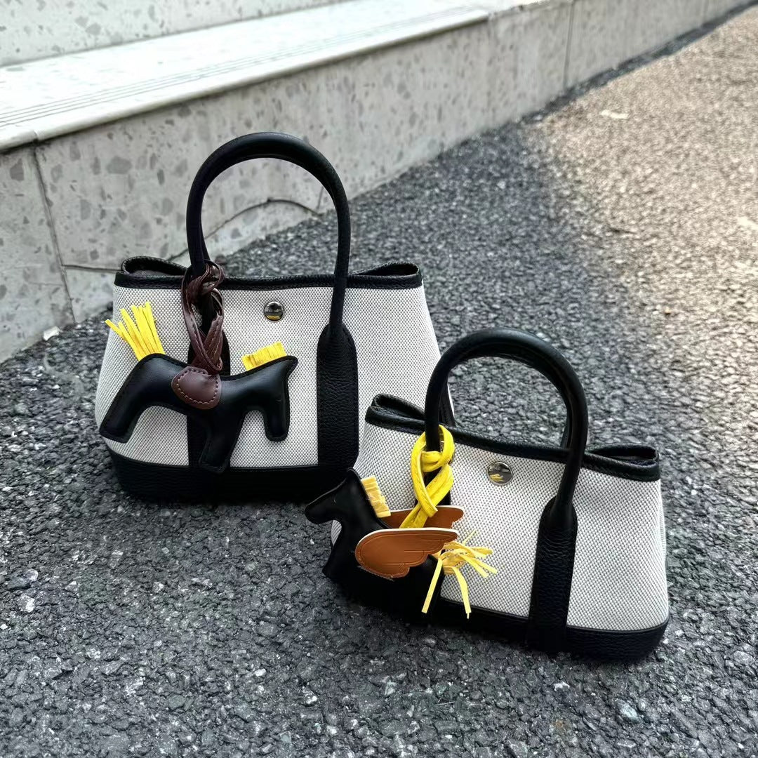 Women's Canvas With First Layer Cowhide Handbags