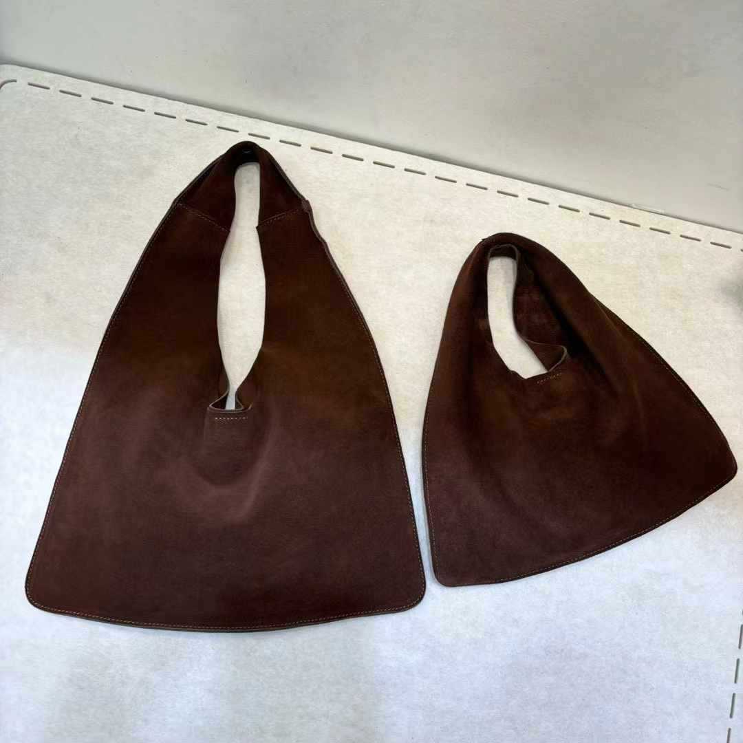 Women's Vegetable Tanning Leather Triangle Genuine Cloud Handbags