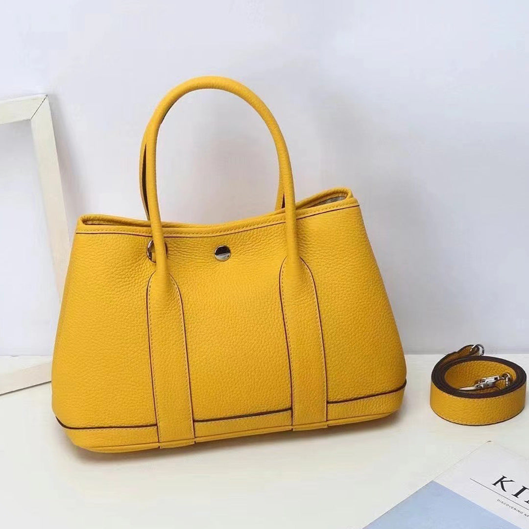 Women's Pattern First Layer Cowhide Genuine Leather Handbags