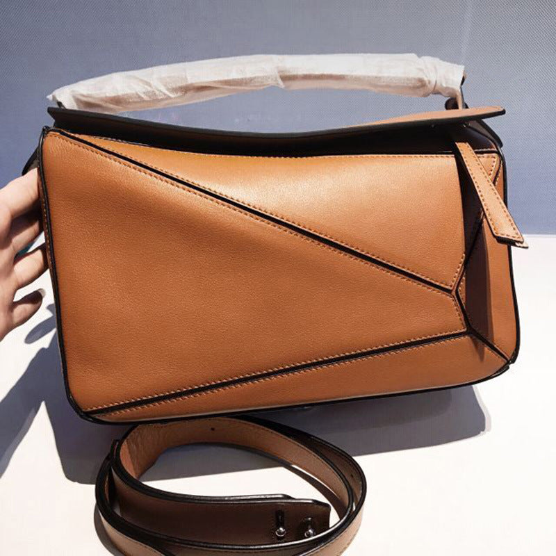 Women's Tide Xi Geometric Stitching Leather Portable Handbags