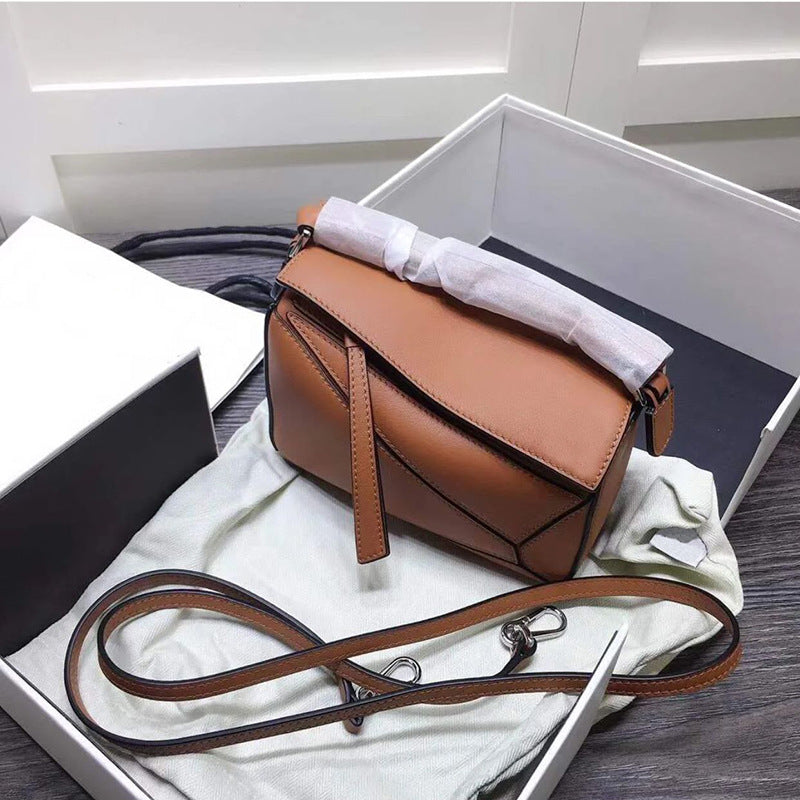 Women's Tide Xi Geometric Stitching Leather Portable Handbags