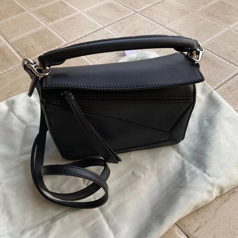 Women's Tide Xi Geometric Stitching Leather Portable Handbags