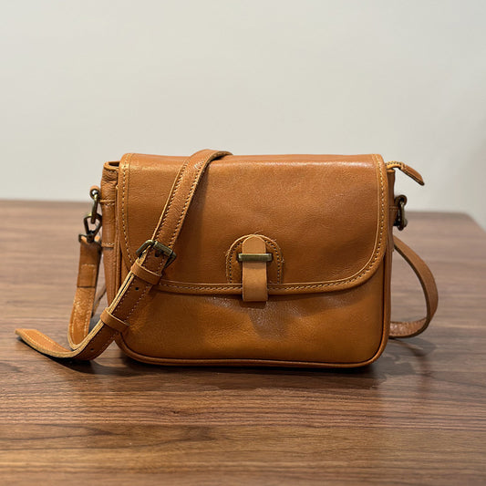 Women's Retro Fashion Vegetable Tanning Leather Ribbon Crossbody Bags