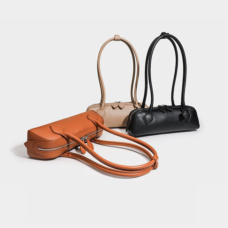 Women's Niche Cowhide French Style Sausage Retro Handbags