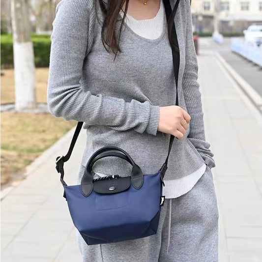 Medium Mini Dumpling Punch Nylon Change Crossbody Bags