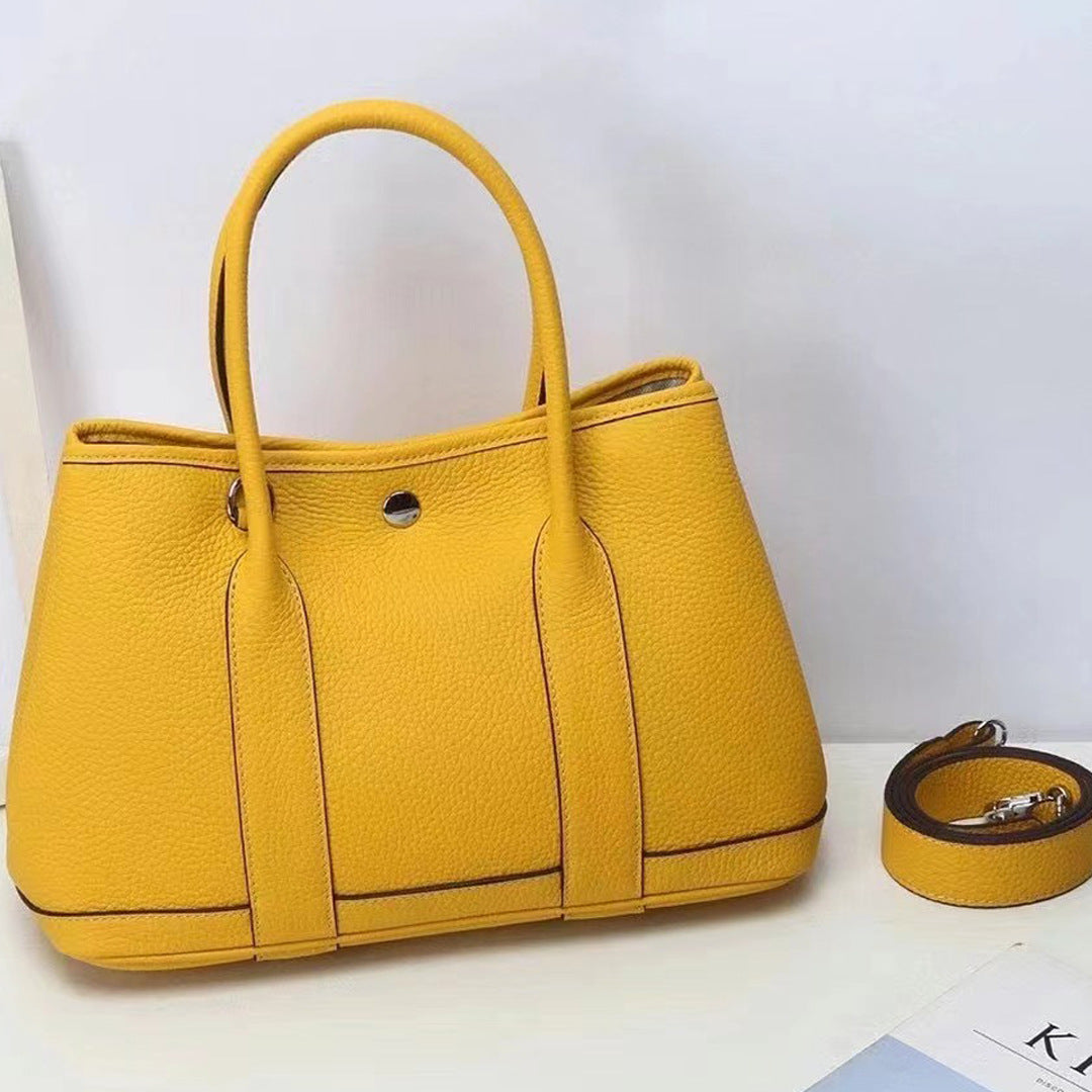 Women's Pattern First Layer Cowhide Genuine Leather Handbags