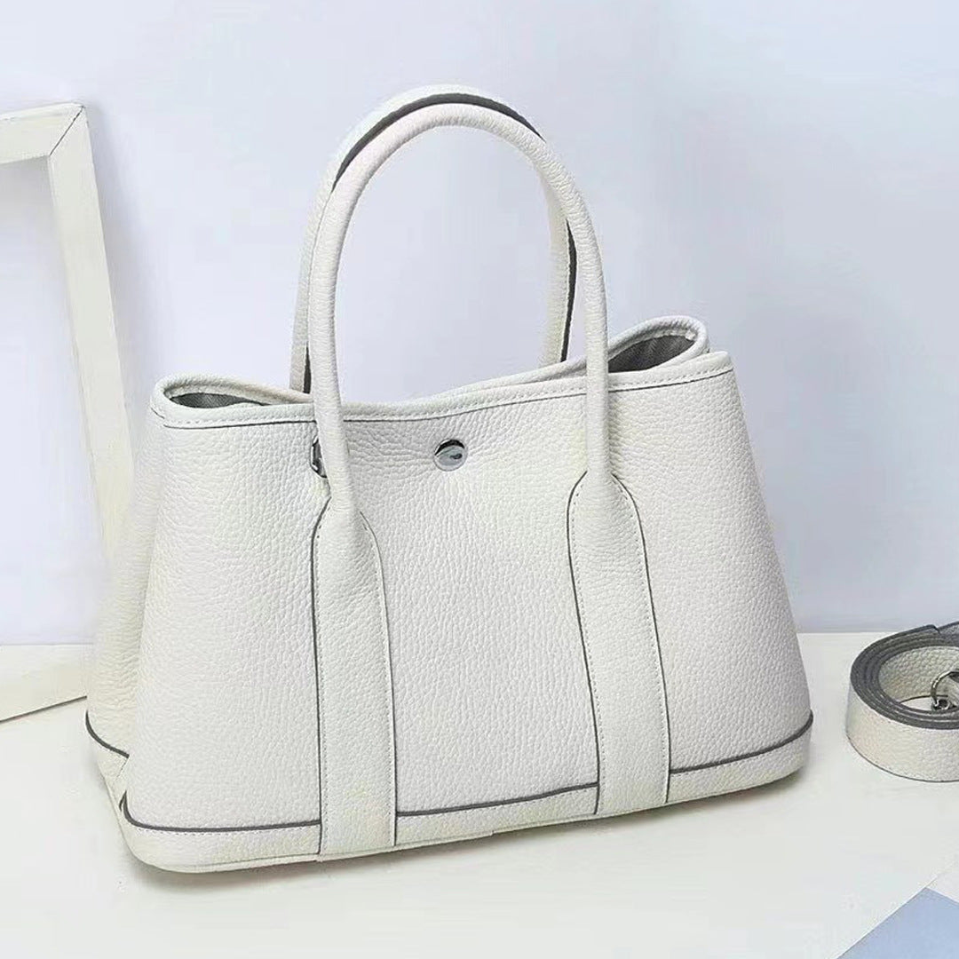 Women's Pattern First Layer Cowhide Genuine Leather Handbags