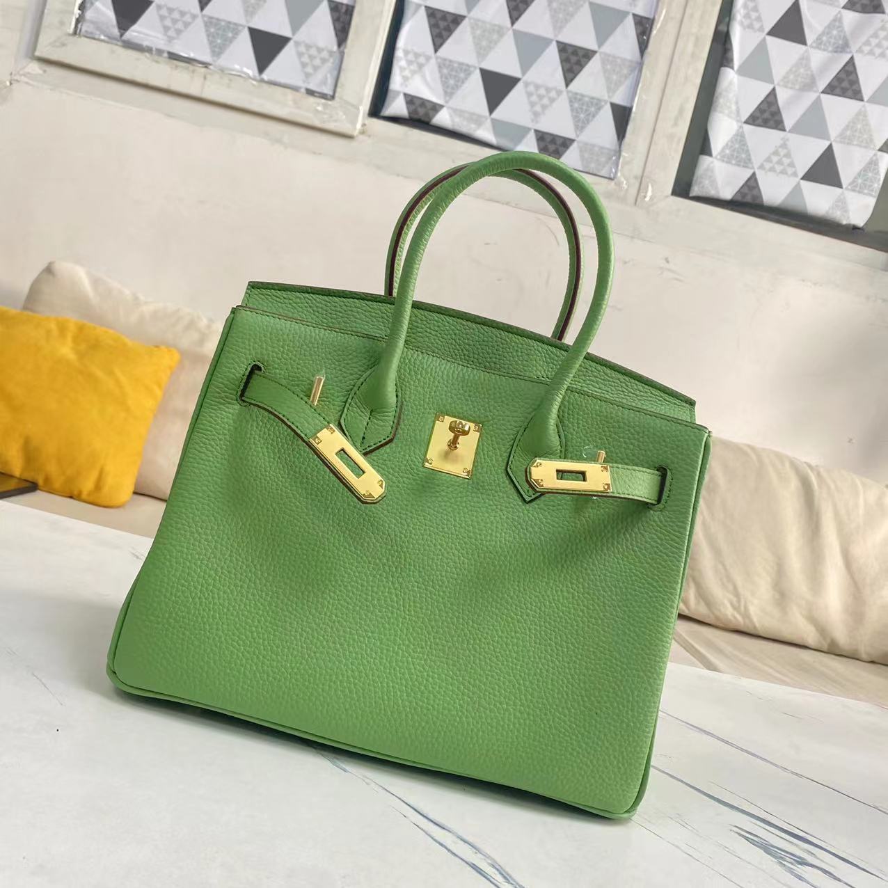 Women's Litchi Grain Cowhide First Layer Kelly Handbags