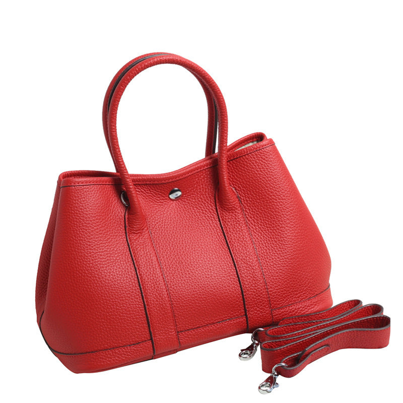 Women's Pattern First Layer Cowhide Genuine Leather Handbags