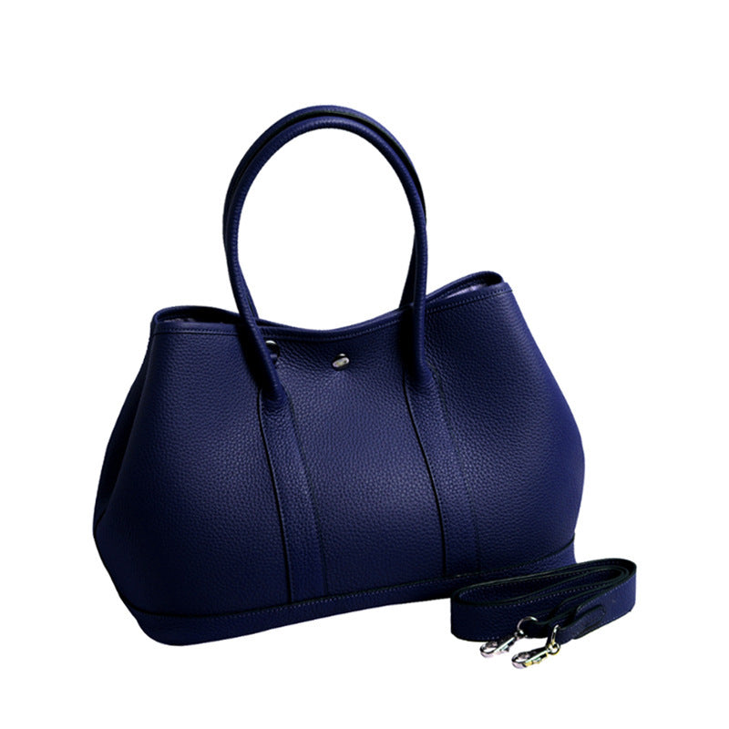 Women's Pattern First Layer Cowhide Genuine Leather Handbags