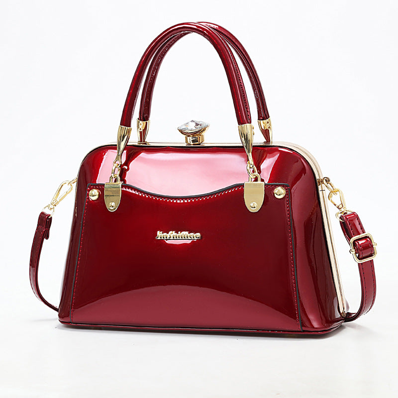 Women's Popular Bright Leather Steel Frame Fashion Handbags