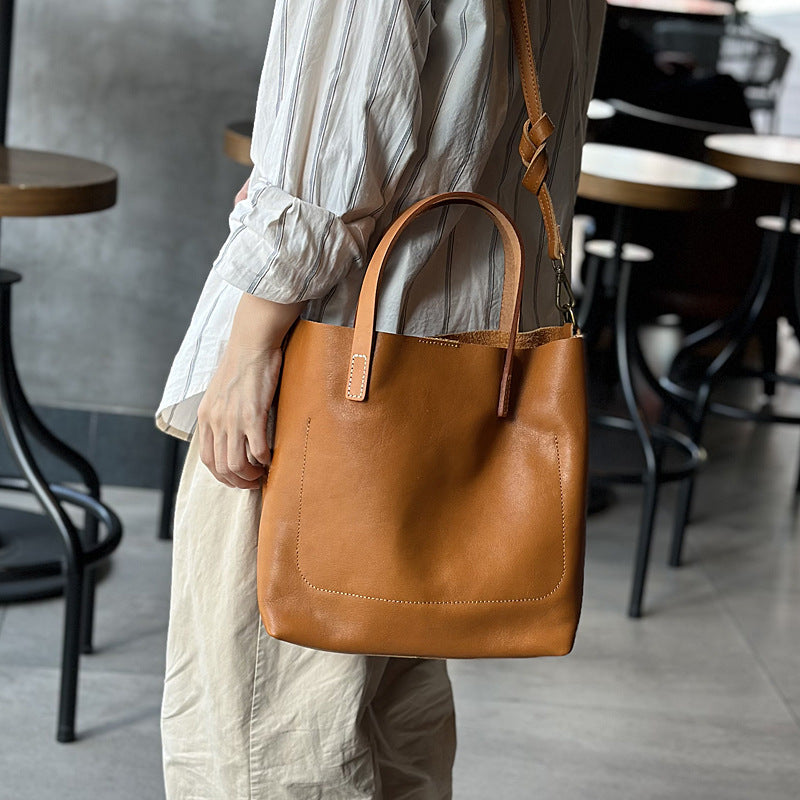 Women's Retro Cowhide Simple Elegant Commuter Genuine Handbags