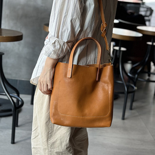 Women's Retro Cowhide Simple Elegant Commuter Genuine Handbags