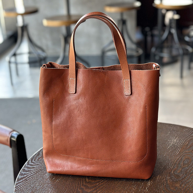 Women's Retro Cowhide Simple Elegant Commuter Genuine Handbags