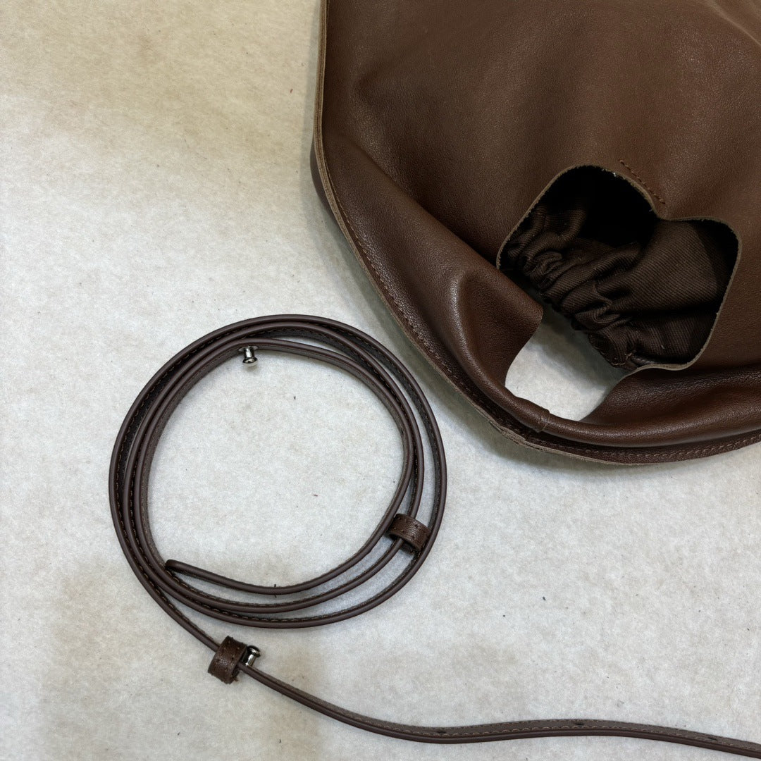 Women's Vegetable Tanning Leather Triangle Genuine Cloud Handbags