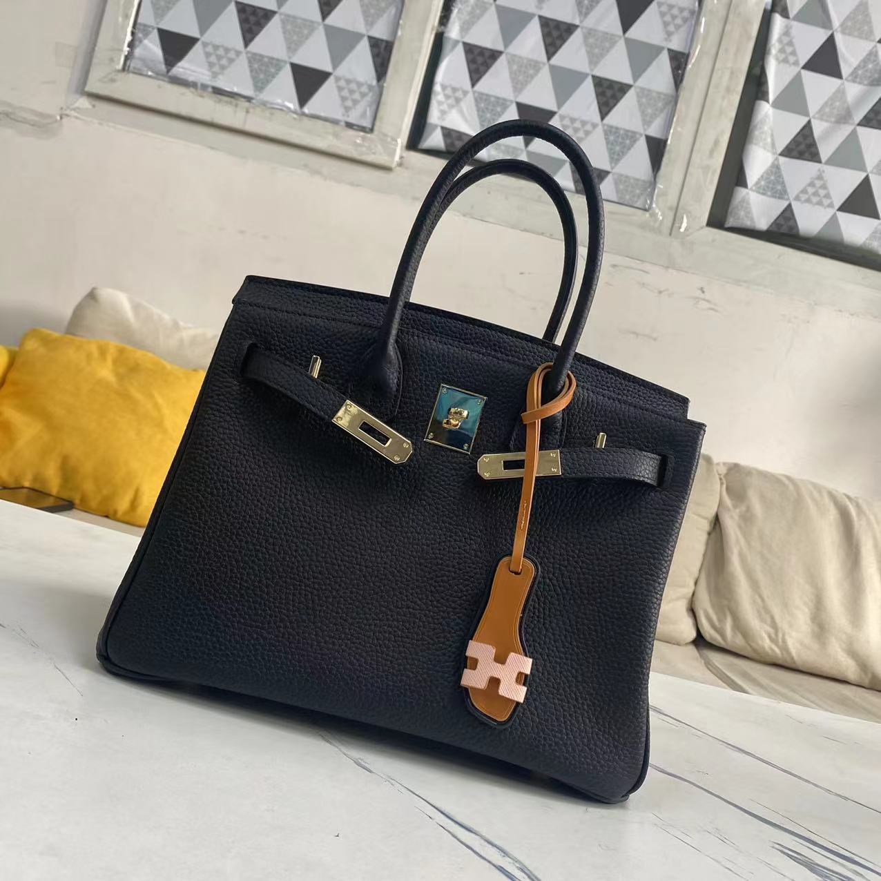 Women's Litchi Grain Cowhide First Layer Kelly Handbags