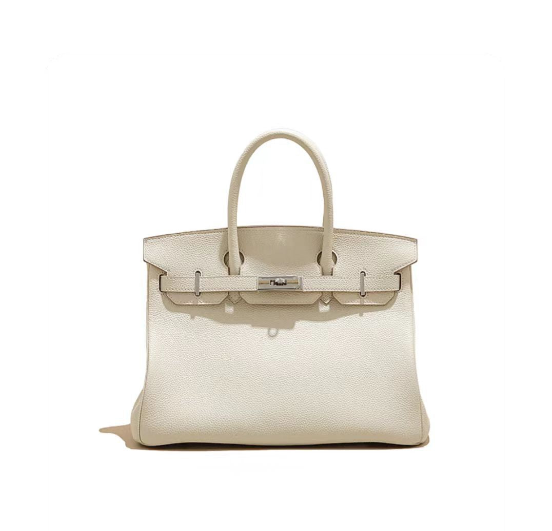 Women's Retro Fashion First Layer Cowhide Genuine Leather Handbags