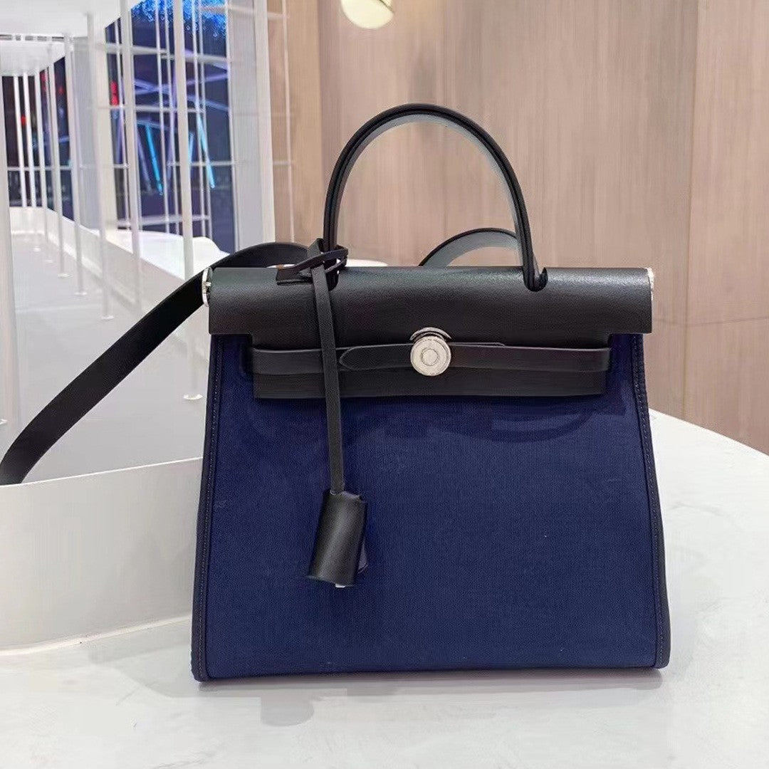 Women's Cowhide Canvas Portable Advanced Genuine Leather Handbags