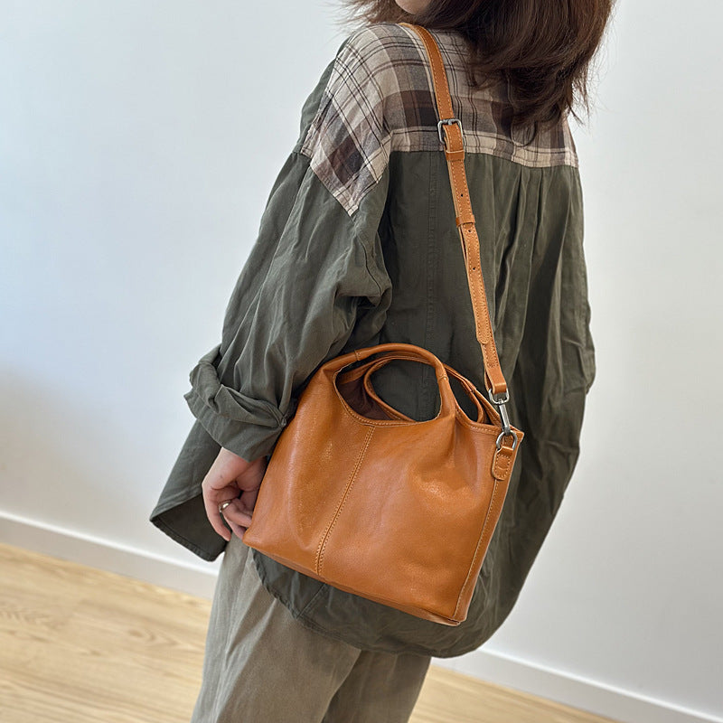 Women's Autumn Genuine Leather Light Retro Vegetable Tanning Handbags
