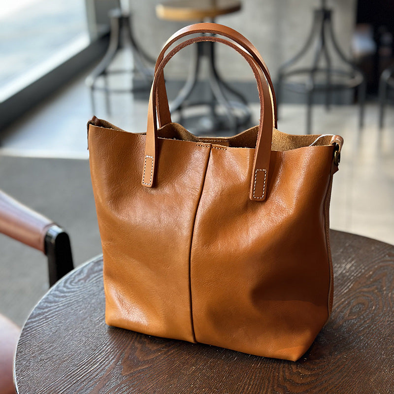 Women's Retro Cowhide Simple Elegant Commuter Genuine Handbags