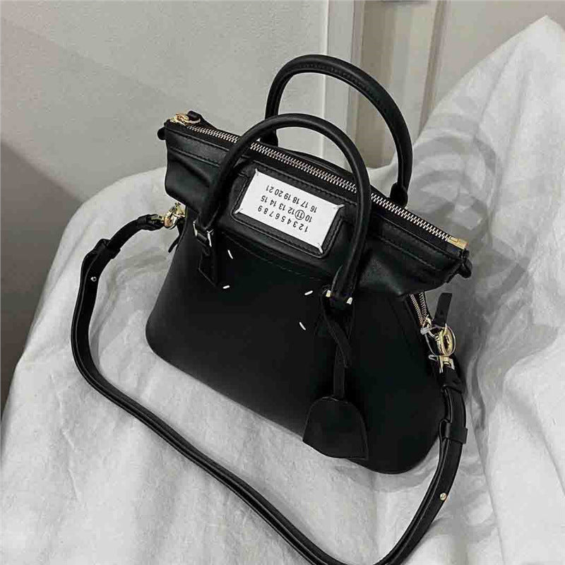 Women's Head Layer Cowhide Minority Genuine Leather Handbags