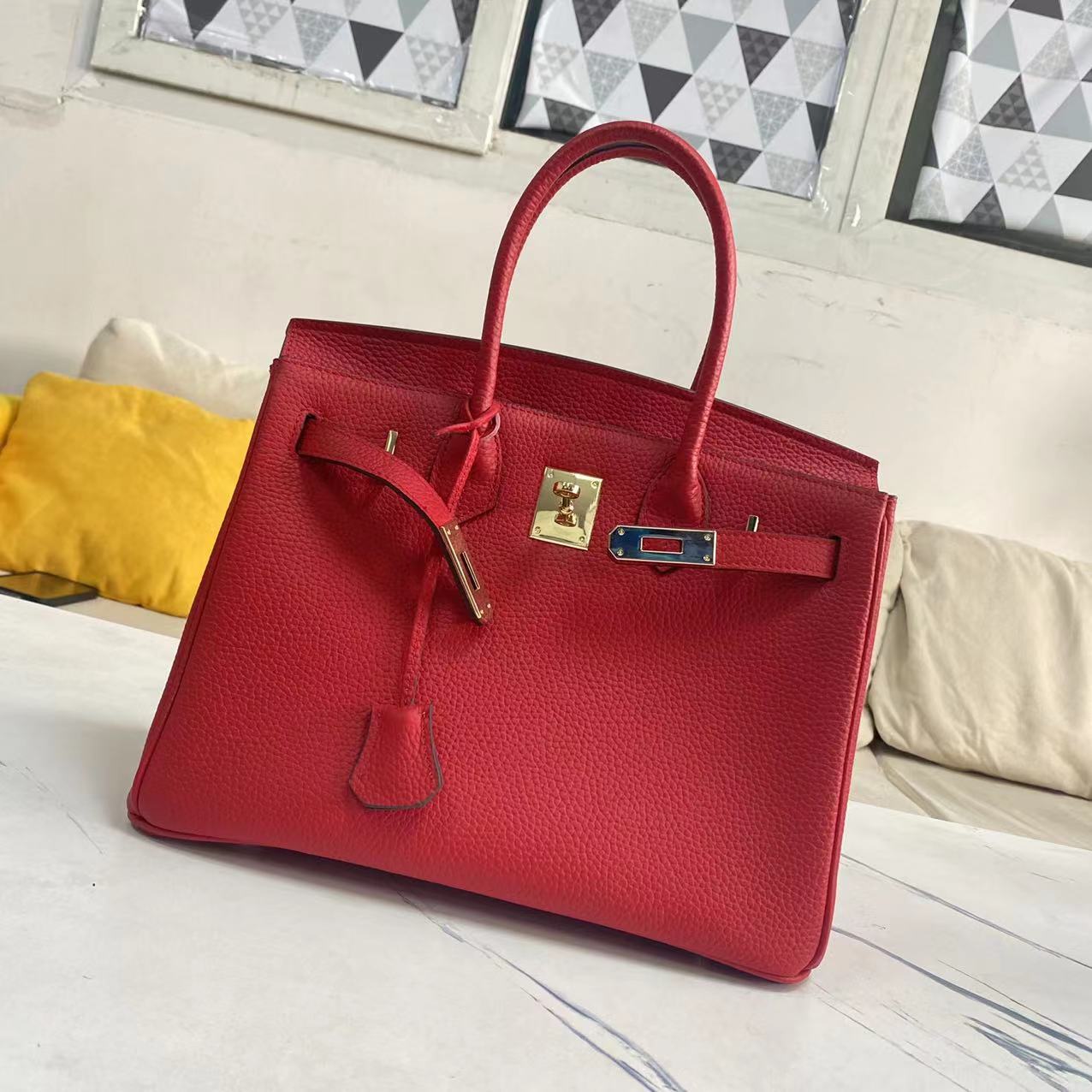 Women's Litchi Grain Cowhide First Layer Kelly Handbags