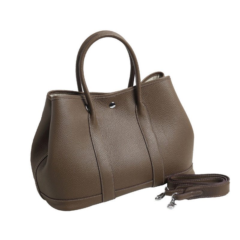 Women's Pattern First Layer Cowhide Genuine Leather Handbags