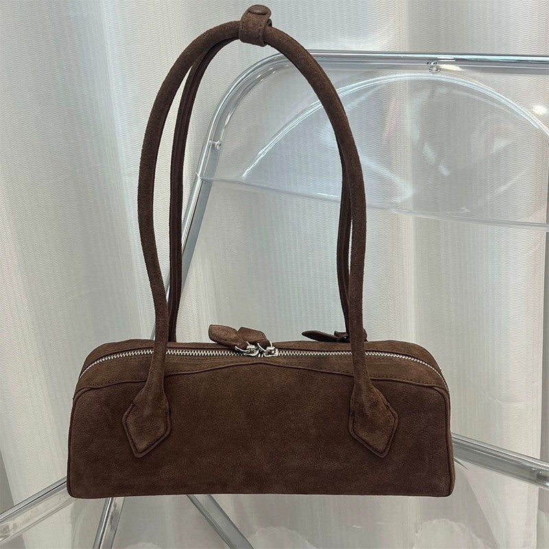 Women's Niche Cowhide French Style Sausage Retro Handbags