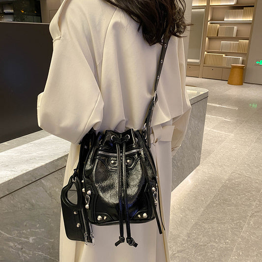 Women's Locomotive Style Rivet Trendy Drawstring Fashion Crossbody Bags