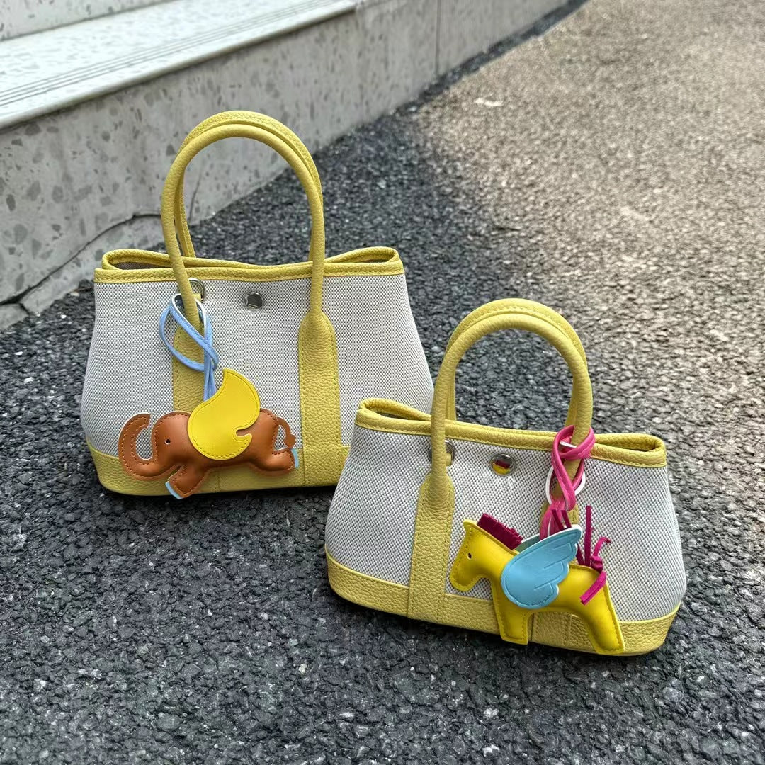 Women's Canvas With First Layer Cowhide Handbags