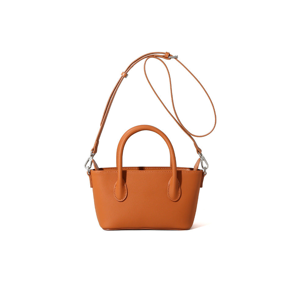 Women's First Layer Cowhide Leather Zipper Simple Handbags
