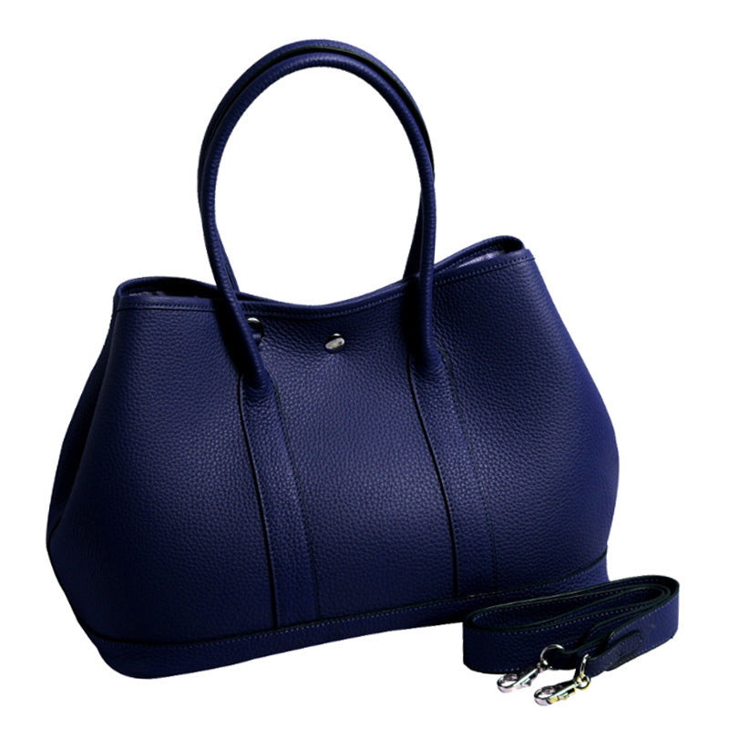 Women's Pattern First Layer Cowhide Genuine Leather Handbags