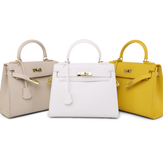Women's Palm Print Cowhide Platinum Twist Genuine Handbags