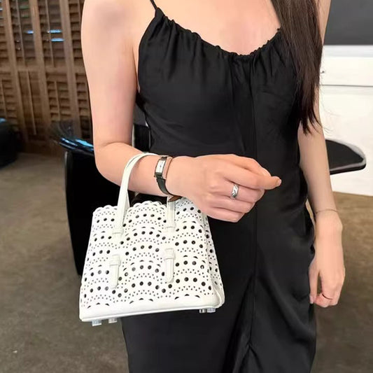 Women's Niche Wave Hollow Carved Cowhide Vegetable Crossbody Bags