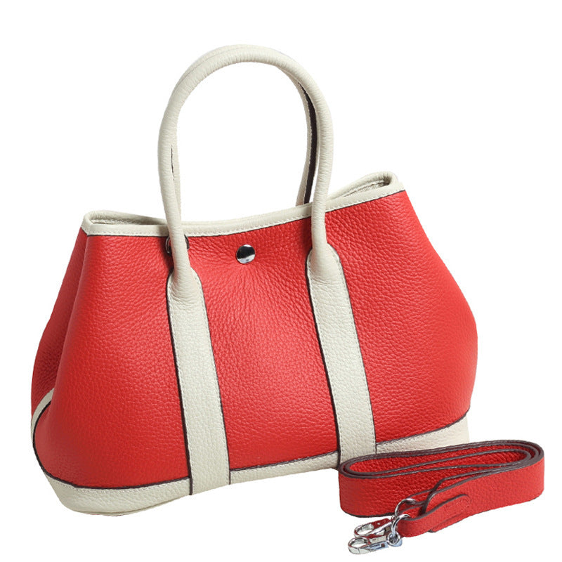 Women's Pattern First Layer Cowhide Genuine Leather Handbags