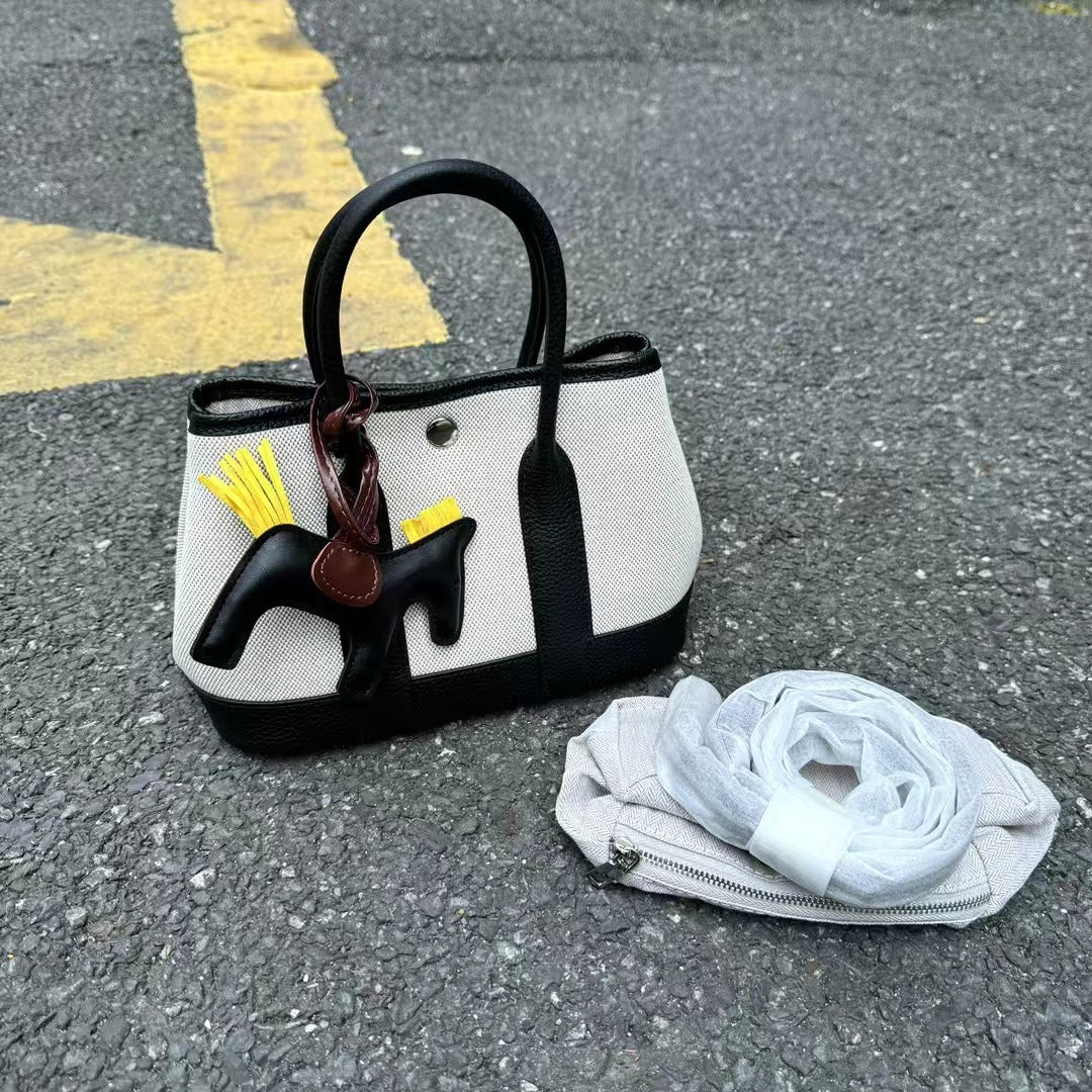 Women's Canvas With First Layer Cowhide Handbags