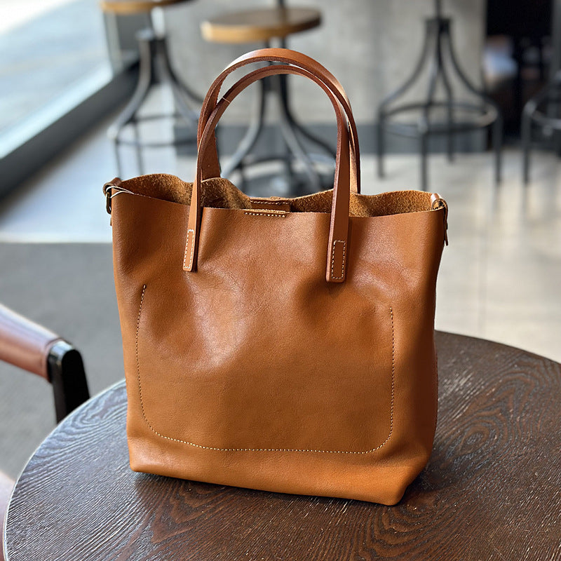 Women's Retro Cowhide Simple Elegant Commuter Genuine Handbags
