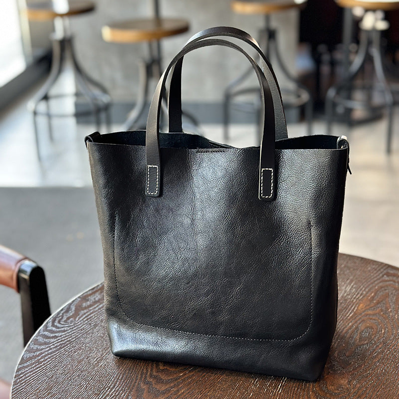 Women's Retro Cowhide Simple Elegant Commuter Genuine Handbags