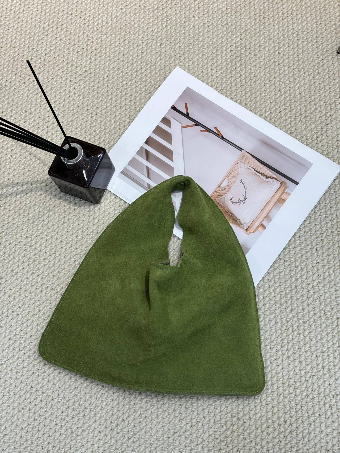 Women's Vegetable Tanning Leather Triangle Genuine Cloud Handbags