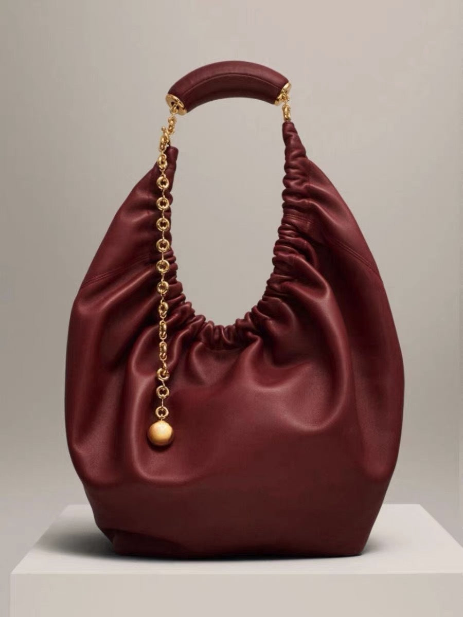 Squeeze High Texture Soft Cowhide Donut Crossbody Bags