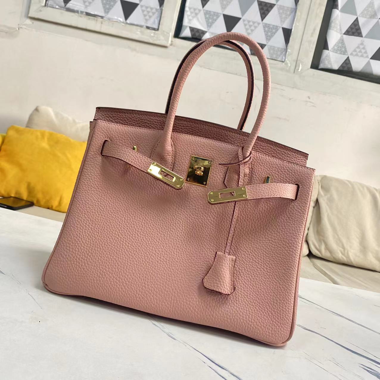 Women's Litchi Grain Cowhide First Layer Kelly Handbags