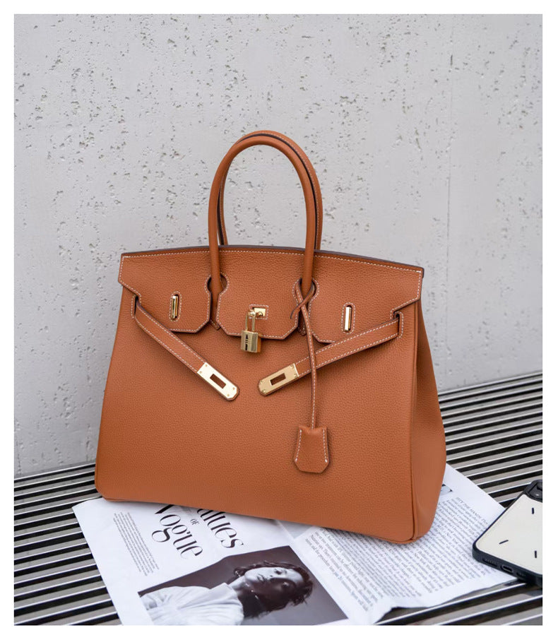 Women's Retro Fashion First Layer Cowhide Genuine Leather Handbags